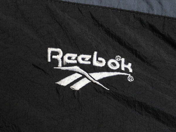 90s リーボック フルジップ ナイロン トラック ジャケット メンズ L 古着 オールド ウインドブレーカー ジャンパー ビッグ ロゴ刺繍 黒 灰