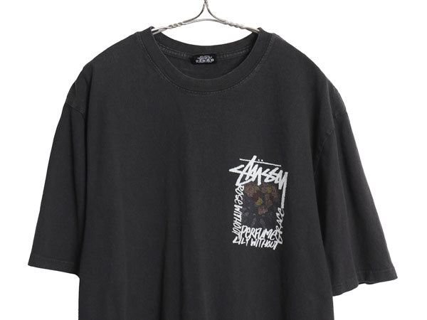 ステューシー 両面 アート イラスト プリント Tシャツ メンズ L / ヘビーウェイト コットン フラワー グラフィック ストック ロゴ ブラック