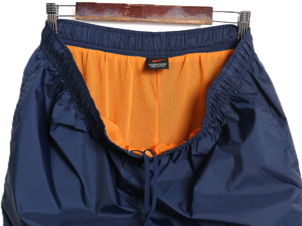 00s ナイキ ナイロン トラック パンツ メンズ XL オールド ウォームアップ イージーパンツ スポーツ スモール スウッシュ ライナー付き 紺