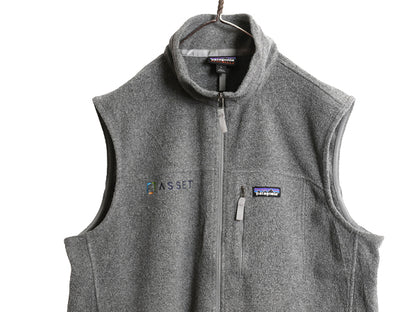 US企画 パタゴニア クラシック シンチラ フリース ベスト メンズ L / 19年製 前開き フルジップ 重ね着 ハイネック ワンポイント 企業 灰