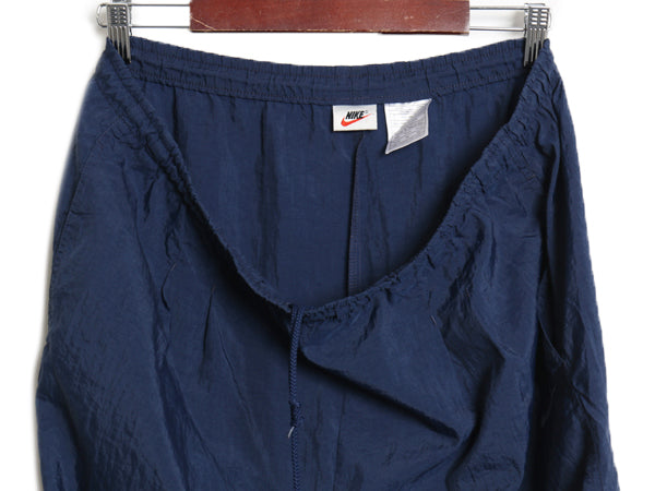 90s ナイキ ナイロン トラック パンツ メンズ XL オールド ツータック 薄手 イージー スポーツ ウォームアップ スウッシュ 大きいサイズ 紺