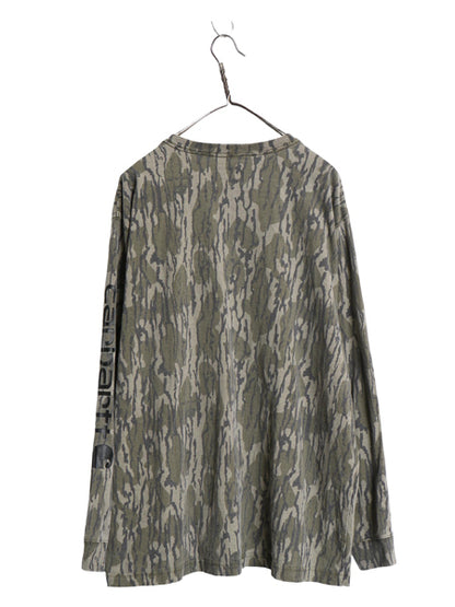 US企画 カーハート リアルツリー カモ ポケット付き 長袖 Tシャツ メンズ XL / ロンT ポケT 総柄 ハンティング 袖 プリント 大きいサイズ