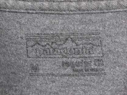 パタゴニア プリント 長袖 Tシャツ メンズ М 古着 Patagonia アウトドア ロンT グラフィック ステッカー ロゴ ワンポイント クルーネック