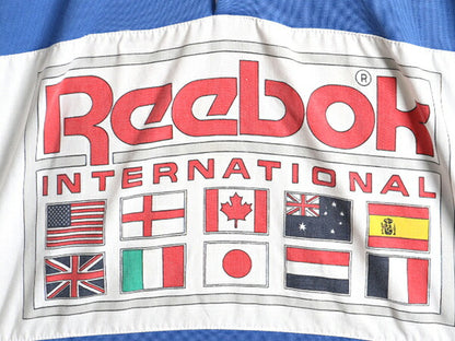 90s ■ リーボック 万国旗 ロゴ プリント ヘンリーネック 半袖 Tシャツ ( メンズ L ) 古着 90年代 オールド Reebok プリントT 2トーン 切替