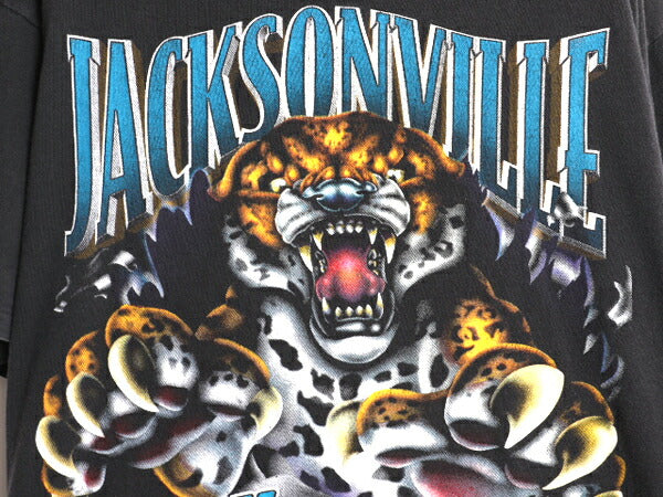 90s USA製 NFL ジャガーズ 両面 イラスト プリント Tシャツ XL オールド アメフト オフィシャル シングルステッチ 黒 NUTMEG 大きいサイズ