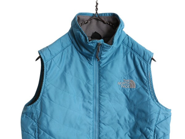 ノースフェイス 中綿 ナイロン ベスト レディース S 古着 The North Face アウトドア 重ね着 前開き ハイネック フルジップ パッカブル 青