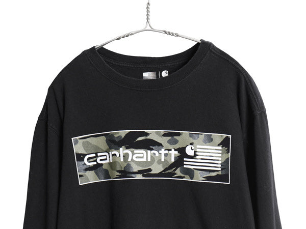 US企画 USA製 カーハート プリント 長袖 Tシャツ メンズ L / RELAXED FIT ロンT ミドルウェイト コットン 星条旗 迷彩柄 グラフィック 黒
