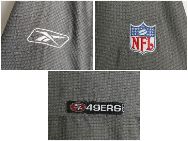 49ers ナイロン トラック ジャケット メンズ M / NFL オフィシャル リーボック フルジップ ウィンドブレーカー アメフト メッシュ ライナー